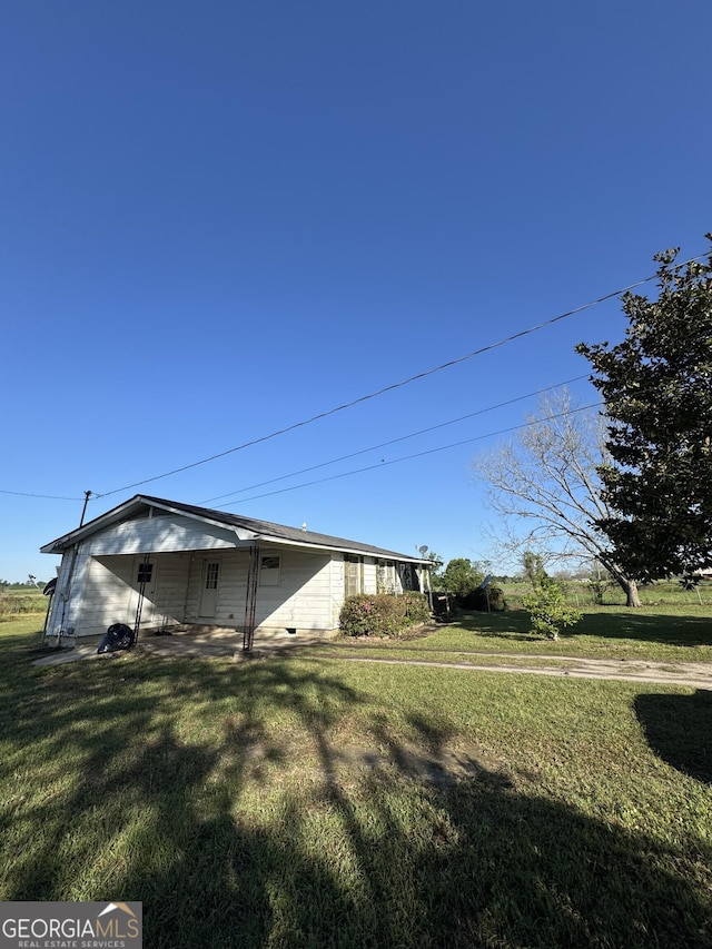 1963 Antioch Church Rd, Eastman, GA 31023 - view of home's exterior with a yard