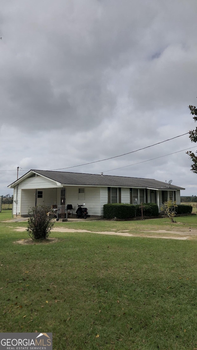 1963 Antioch Church Rd, Eastman, GA 31023 - ranch-style house with a front lawn