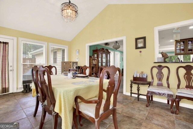 4845 Willow St, Acworth, GA 30101 - dining area with a chandelier and high vaulted ceiling
