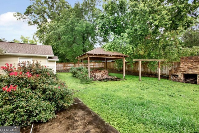 4845 Willow St, Acworth, GA 30101 - fenced backyard with a gazebo