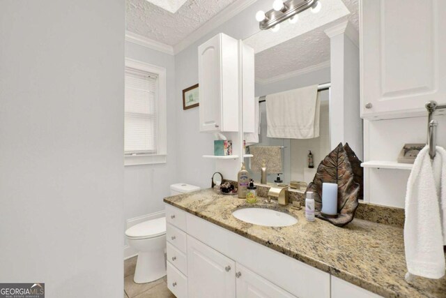 4845 Willow St, Acworth, GA 30101 - bathroom featuring vanity, crown molding, a textured ceiling, and tile patterned flooring