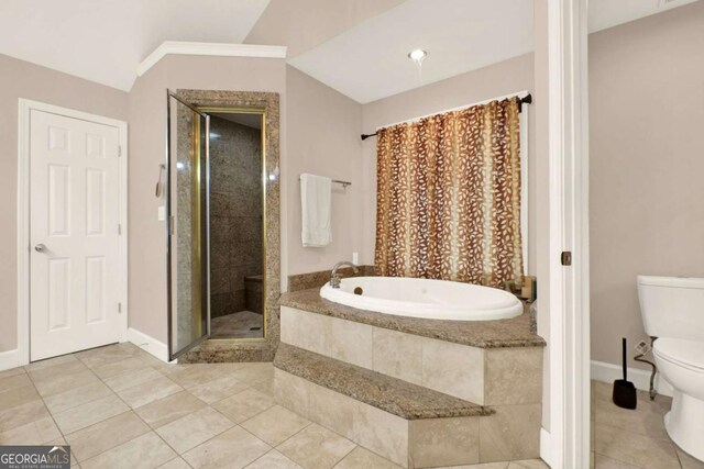 4845 Willow St, Acworth, GA 30101 - bathroom with tile patterned floors, a garden tub, a stall shower, and lofted ceiling
