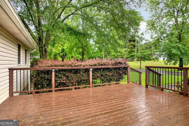 4845 Willow St, Acworth, GA 30101 - wooden terrace featuring a yard and view of wooded area