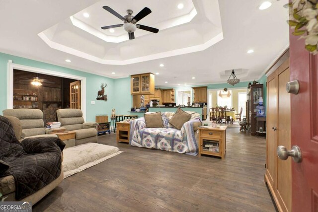 4845 Willow St, Acworth, GA 30101 - living room featuring a ceiling fan, a tray ceiling, recessed lighting, and dark wood-type flooring