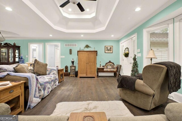 4845 Willow St, Acworth, GA 30101 - living area with ceiling fan, ornamental molding, wood finished floors, a raised ceiling, and plenty of natural light