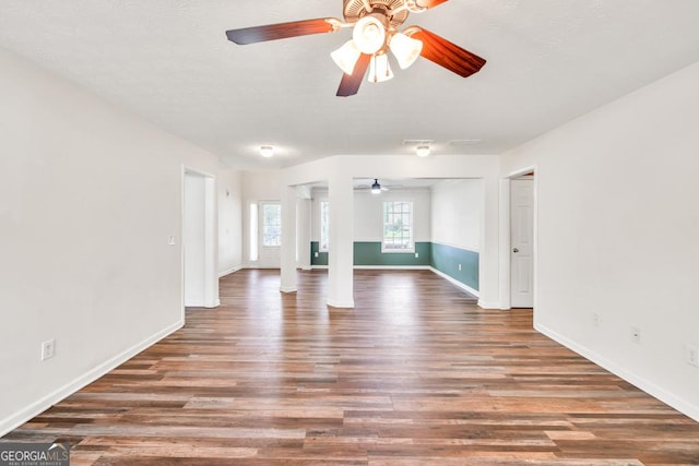 3338 Gardenside Walk, Loganville, GA 30052 - unfurnished living room with a ceiling fan and wood finished floors