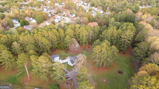 935 Old Loganville Rd, Loganville, GA 30052 - aerial view of property's location with a heavily wooded area