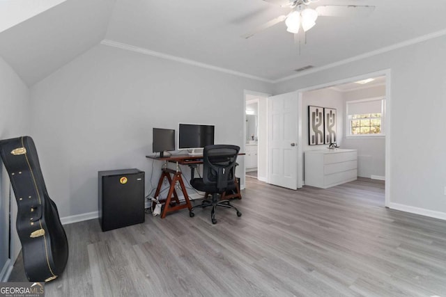 935 Old Loganville Rd, Loganville, GA 30052 - office space featuring a ceiling fan, wood finished floors, ornamental molding, and lofted ceiling