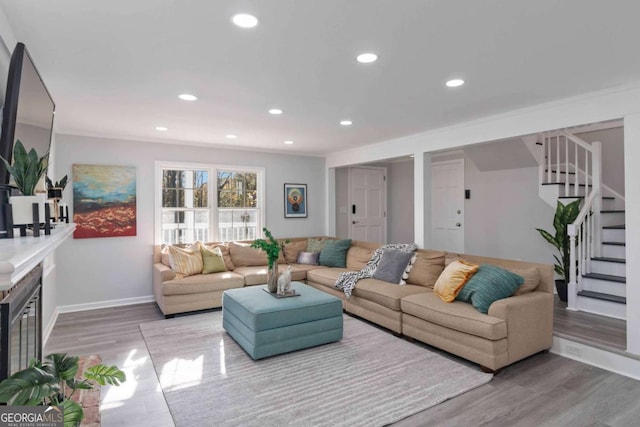 935 Old Loganville Rd, Loganville, GA 30052 - living area with wood finished floors, stairway, and recessed lighting