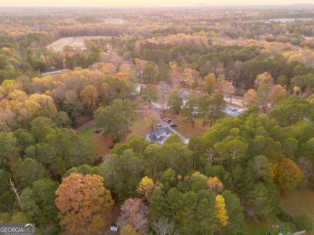 935 Old Loganville Rd, Loganville, GA 30052 - aerial overview of property's location featuring a forest