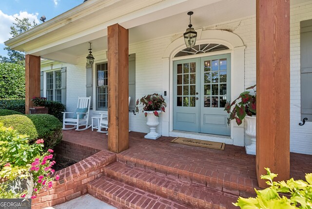 206 Savanna Estates Ct, Canton, GA 30115 - property entrance with covered porch and brick siding