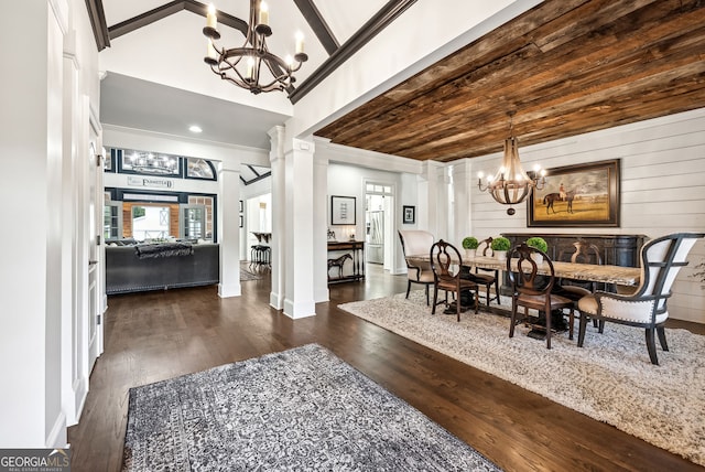 206 Savanna Estates Ct, Canton, GA 30115 - dining area featuring a chandelier, ornate columns, wood finished floors, crown molding, and lofted ceiling