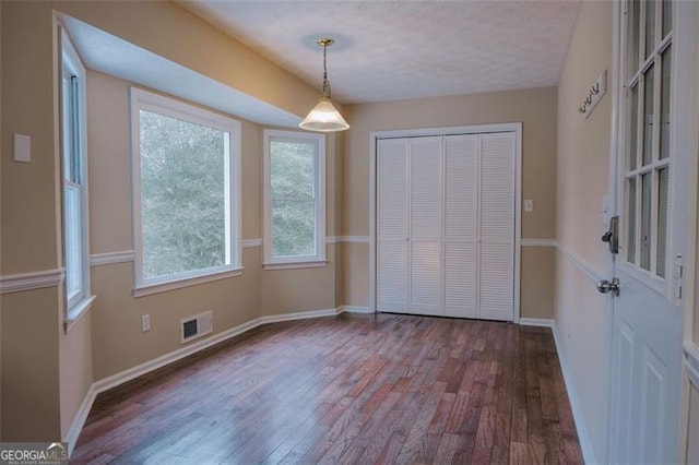 110 Fox Meadow Dr, Covington, GA 30016 - unfurnished dining area featuring hardwood / wood-style floors and baseboards