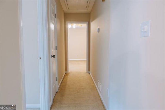 110 Fox Meadow Dr, Covington, GA 30016 - hallway featuring attic access, light colored carpet, and baseboards