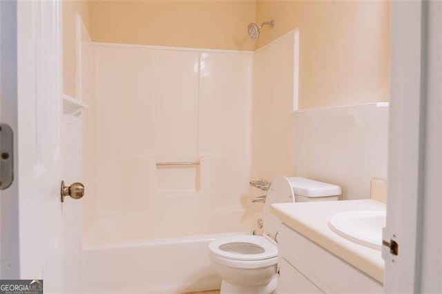 110 Fox Meadow Dr, Covington, GA 30016 - bathroom featuring  shower combination, vanity, toilet, a wainscoted wall, and a decorative wall