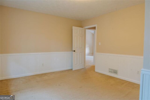 110 Fox Meadow Dr, Covington, GA 30016 - carpeted empty room featuring a wainscoted wall