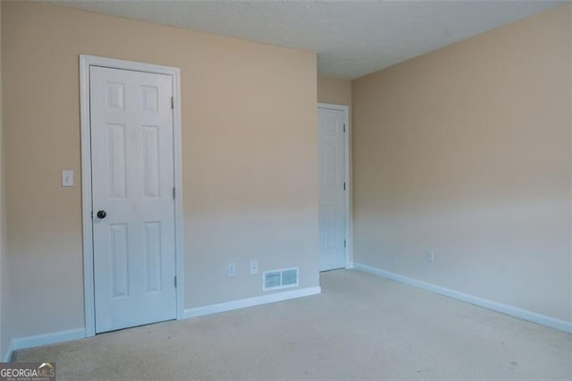 110 Fox Meadow Dr, Covington, GA 30016 - unfurnished bedroom featuring carpet floors and baseboards