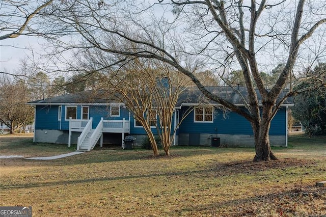 110 Fox Meadow Dr, Covington, GA 30016 - view of front of property featuring crawl space, a front yard, and stairway