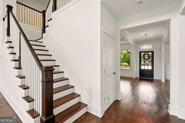 847 Rolling Hl, Kennesaw, GA 30152 - foyer entrance with stairway, wood finished floors, a chandelier, and baseboards