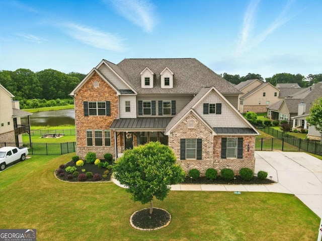 847 Rolling Hl, Kennesaw, GA 30152 - craftsman house with brick siding, a water view, a standing seam roof, and roof with shingles
