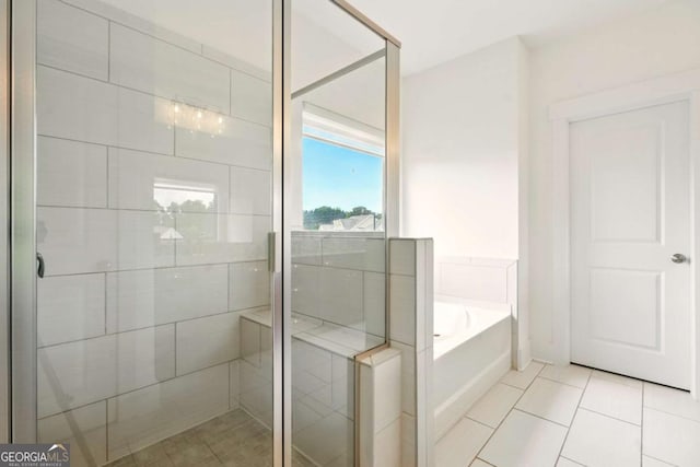 847 Rolling Hl, Kennesaw, GA 30152 - bathroom with a bath, a stall shower, and tile patterned floors