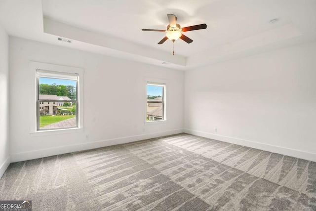 847 Rolling Hl, Kennesaw, GA 30152 - empty room with a raised ceiling, carpet flooring, baseboards, and a ceiling fan