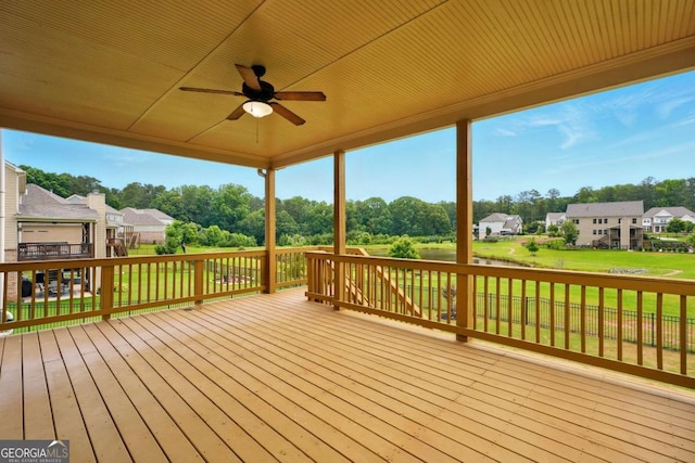 847 Rolling Hl, Kennesaw, GA 30152 - deck featuring a ceiling fan, a yard, view of scattered trees, and a residential view