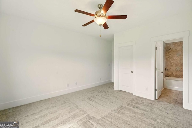 847 Rolling Hl, Kennesaw, GA 30152 - unfurnished bedroom with light carpet, baseboards, connected bathroom, and ceiling fan