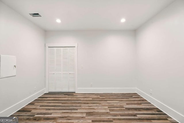 847 Rolling Hl, Kennesaw, GA 30152 - spare room featuring wood finished floors, baseboards, and recessed lighting