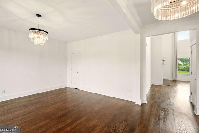 847 Rolling Hl, Kennesaw, GA 30152 - empty room with a chandelier, dark wood-style floors, and baseboards