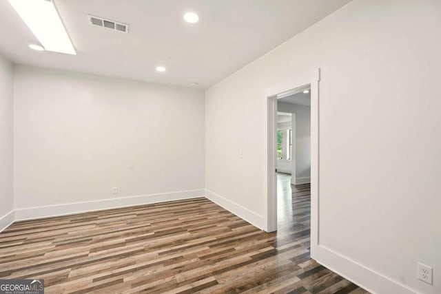 847 Rolling Hl, Kennesaw, GA 30152 - empty room featuring wood finished floors, baseboards, and recessed lighting