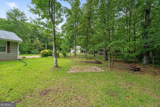 1267 Austin Bridge Rd, Douglasville, GA 30134 - view of yard featuring a fire pit