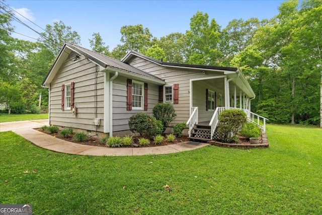 1267 Austin Bridge Rd, Douglasville, GA 30134 - view of front of house with a porch and a front lawn