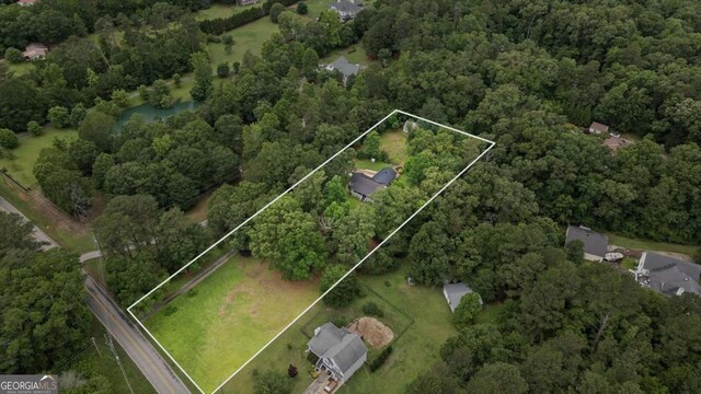 1267 Austin Bridge Rd, Douglasville, GA 30134 - aerial view of property's location featuring property boundaries highlighted and a forest