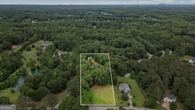1267 Austin Bridge Rd, Douglasville, GA 30134 - aerial view of property and surrounding area with property parcel outlined