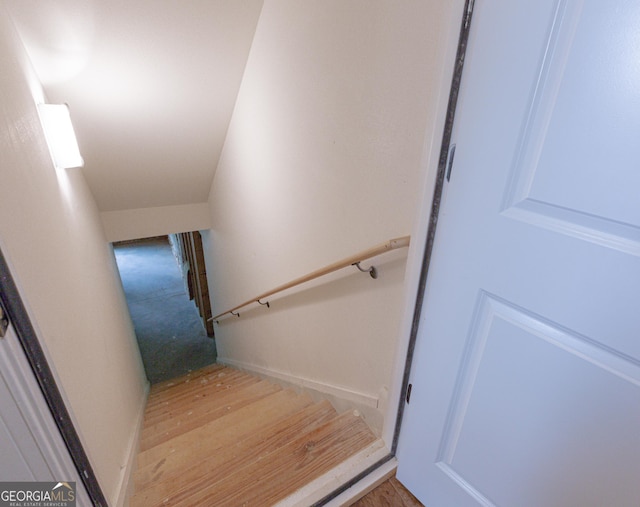 319 Beaconsfield Dr, Sharpsburg, GA 30277 - stairs featuring wood finished floors