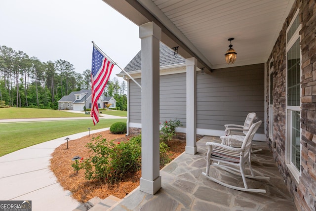 319 Beaconsfield Dr, Sharpsburg, GA 30277 - porch featuring a lawn