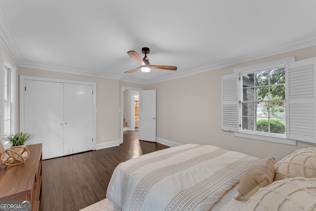 2596 Midway Rd, Decatur, GA 30030 - bedroom with dark wood finished floors, ornamental molding, baseboards, a closet, and a ceiling fan
