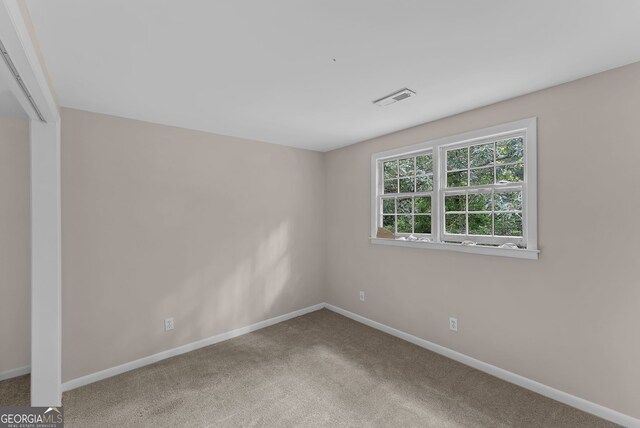 2596 Midway Rd, Decatur, GA 30030 - carpeted empty room with baseboards