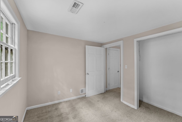 2596 Midway Rd, Decatur, GA 30030 - unfurnished bedroom featuring carpet floors and baseboards