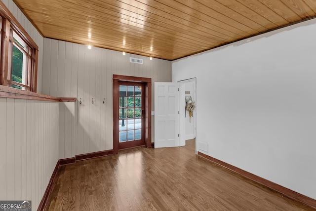 2596 Midway Rd, Decatur, GA 30030 - entrance foyer featuring plenty of natural light, wood finished floors, wooden ceiling, and baseboards