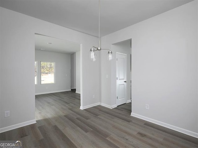 250 Shawnee Trl, Dallas, GA 30157 - unfurnished dining area with dark wood-style floors and a chandelier