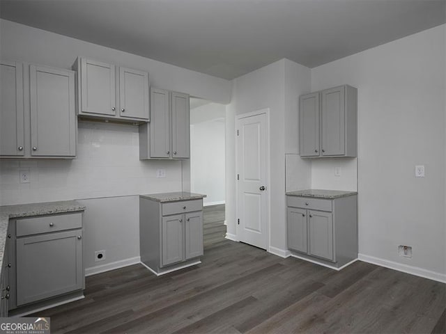 250 Shawnee Trl, Dallas, GA 30157 - kitchen featuring gray cabinetry, dark wood-style flooring, and light stone countertops