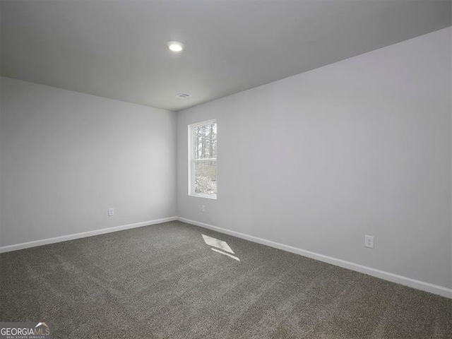 250 Shawnee Trl, Dallas, GA 30157 - empty room with dark carpet, baseboards, and recessed lighting
