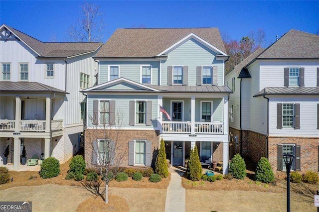 164 Inwood Walk, Woodstock, GA 30188 - view of front of house featuring a balcony, a porch, and brick siding