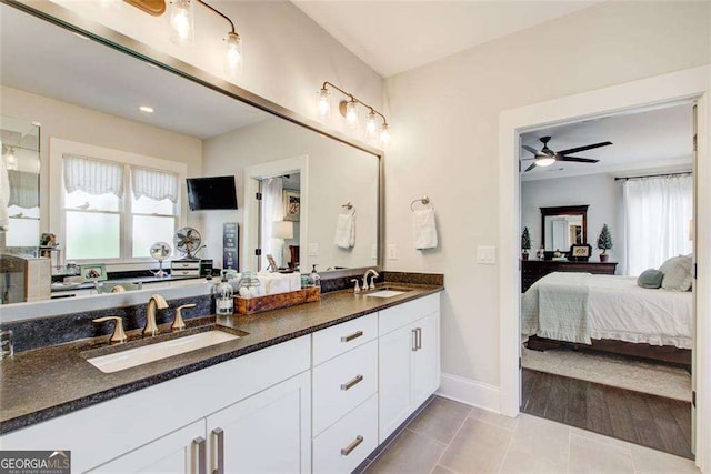 164 Inwood Walk, Woodstock, GA 30188 - ensuite bathroom with double vanity, plenty of natural light, tile patterned flooring, and a ceiling fan