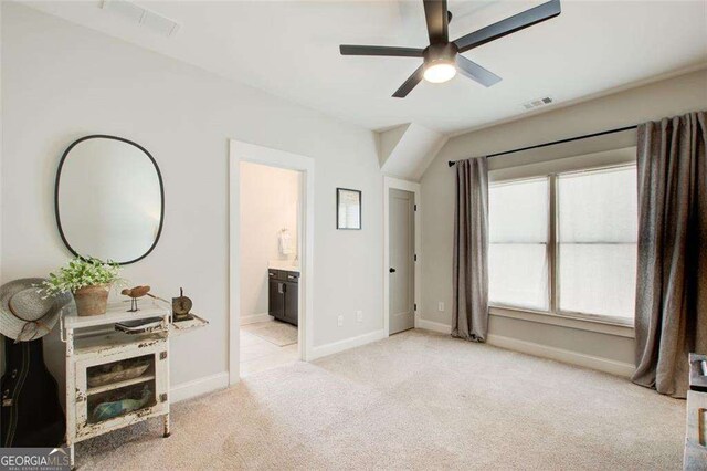 164 Inwood Walk, Woodstock, GA 30188 - bedroom featuring light carpet, baseboards, and connected bathroom