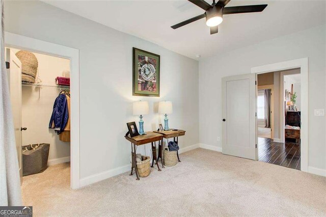 164 Inwood Walk, Woodstock, GA 30188 - carpeted bedroom featuring a spacious closet, baseboards, a closet, and a ceiling fan