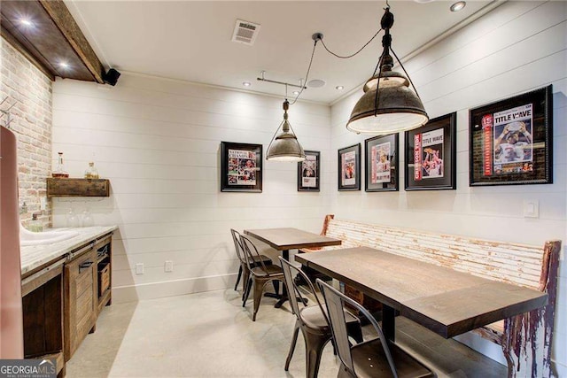 164 Inwood Walk, Woodstock, GA 30188 - dining area featuring concrete floors and baseboards
