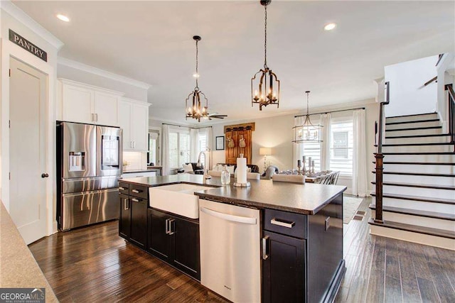 164 Inwood Walk, Woodstock, GA 30188 - kitchen featuring appliances with stainless steel finishes, a sink, a chandelier, recessed lighting, and a kitchen island with sink